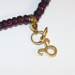 Grounded Taurus Zodiac Charm